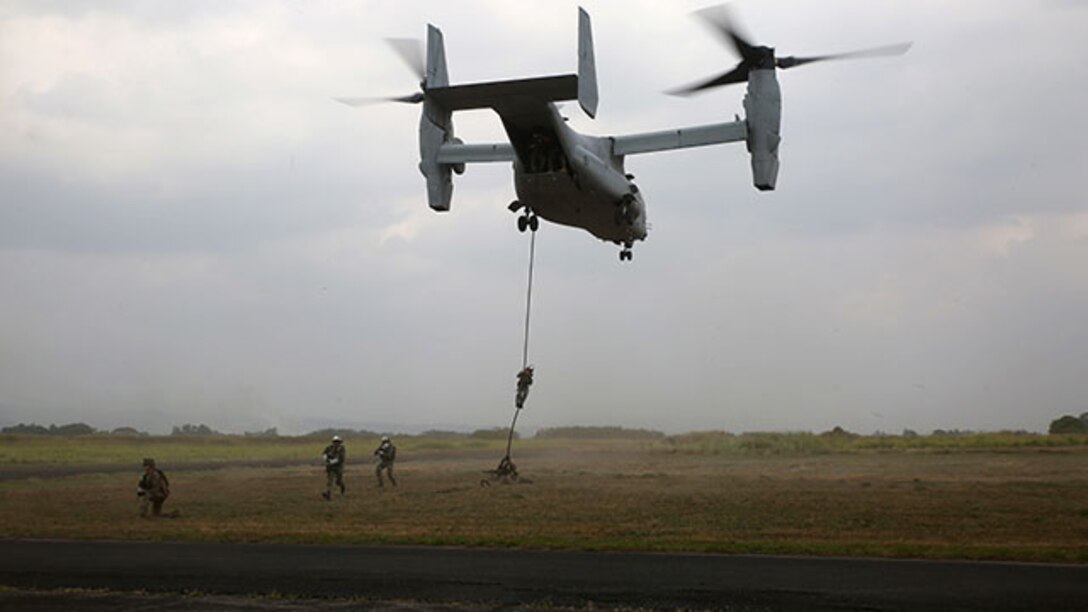 Philippine and U.S. Marines fast-rope out back of an MV-22 Osprey Jan. 22 at Basa Air Field for a bilateral fast-rope exercise. Fast-roping is just one of the multiple training events conducted during Aviation Assault Support Exercise 15.1. AASE expands and promotes cooperative training opportunities with the Armed Forces of the Philippines to enhance core skill proficiency and to increase operational readiness. The Philippine Marines are with various units and the U.S. Marines are with 3rd Battalion, 3rd Marine Regiment currently assigned to 3rd Marine Division, III Marine Expeditionary Force under the unit deployment program.  (U.S. Marine Corps photo by Lance Cpl. Ryan C. Mains/Released).