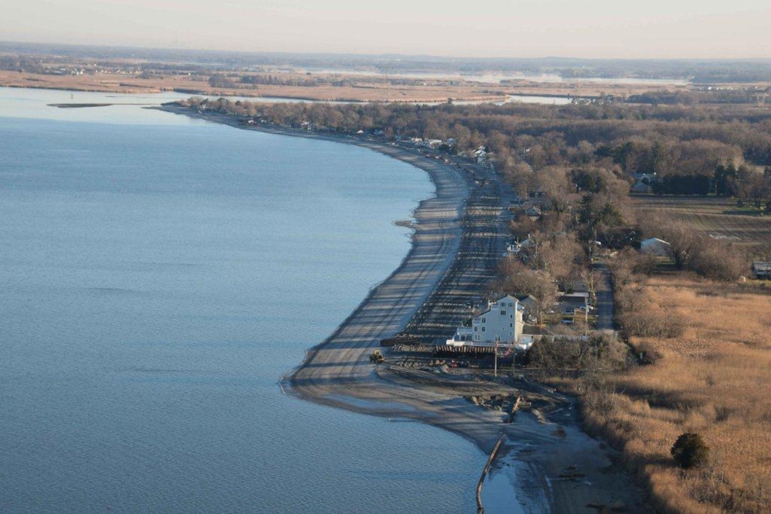 The U.S. Army Corps of Engineers constructed a 50-foot berm at Oakwood Beach in Salem County, N.J. to reduce the risk of future storm damages. The two mile project involved pumping 350,000 cubic yards of sand from the Delaware River onto the beach. Great Lakes Dredge & Dock Company served as contractor and completed construction in December of 2014. 