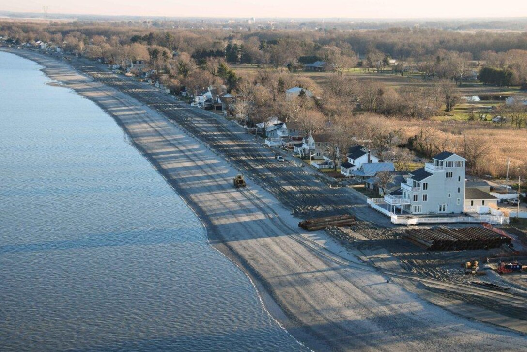 The U.S. Army Corps of Engineers constructed a 50-foot berm at Oakwood Beach in Salem County, N.J. to reduce the risk of future storm damages. The two mile project involved pumping 350,000 cubic yards of sand from the Delaware River onto the beach. Great Lakes Dredge & Dock Company served as contractor and completed construction in December of 2014