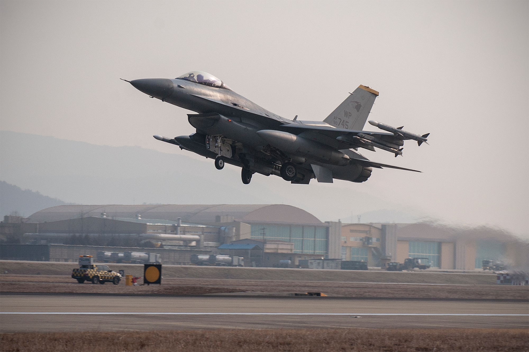 An F-16 Fighting Falcon from the 8th Fighter Wing takes off during exercise Buddy Wing 15-2 Feb. 5, 2015, at Daegu Air Base, South Korea. Buddy Wing exercises are held multiple times a year to enhance interoperability between  the U.S. and South Korean air forces, promote cultural awareness; and integrate mission planning, briefing, flying and debriefing. (U.S. Air Force photo/Senior Airman Katrina Heikkinen)
