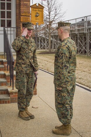 United States Marine Corps Warrant Officer Nathan D. Morris receives his first salute following his promotion ceremony held in Center House at Marine Barracks, Washington, D.C., on Feb. 5, 2015. (U.S. Marine Corps photo by Staff Sgt. Mallory S. VanderSchans/Released)