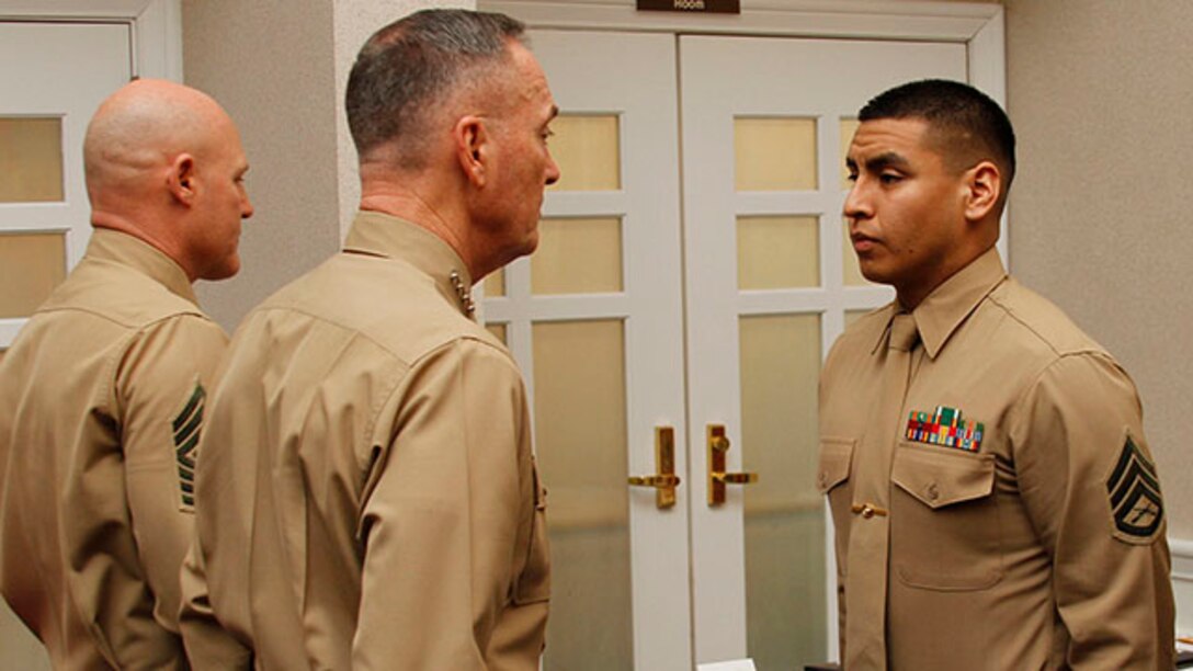 Staff Sgt. Jose Flores, non-prior service recruiter, Recruiting Station Substation Patchogue, New York, was awarded the Navy and Marine Corps Commendation Medal for being named the Non-Prior Service Recruiter of the Year for FY14 on Jan. 29 at the Clubs at Quantico during the Combined Awards Ceremony. Flores was also meritoriously promoted from the rank of sergeant to staff sergeant.