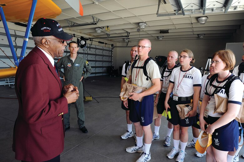 James H. Harvey III, a documented original Tuskegee Airman, talks to basic cadets during his visit to the U.S. Air Force Academy airfield in 2011. 