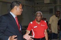 Maxwell AFB, Ala. - Col R.J. Lewis (left) talks with Lt Col James H. Harvey III during a barbecue honoring the 2012 Gathering of Eagles panelists on June 7, 2012 at 908th Airlift Wing hangar 1455.  During the week of June 5 - 9, 2012,  the Air Command and Staff College hosted the 2012 "Gathering of Eagles" , an annual event designed to interview and present selected Eagles to the students to further air space, cyberspace and leadership history. 