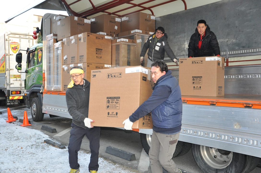 Contractors off-load new furniture at a U.S. Army Corps of Engineers Far East District facility in January. The new furniture is part of a $6.7 million administrative furniture replacement project for 82 U.S. Army facilities across the South Korean peninsula. 