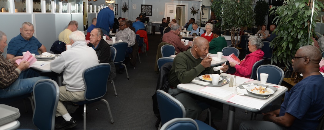 Retired service members from every branch of the armed forces visit with one another, Feb. 4, for the installation's monthly Retiree Breakfast, which was held at Marine Corps Logistics Base Albany's Town and Country Restaurant.