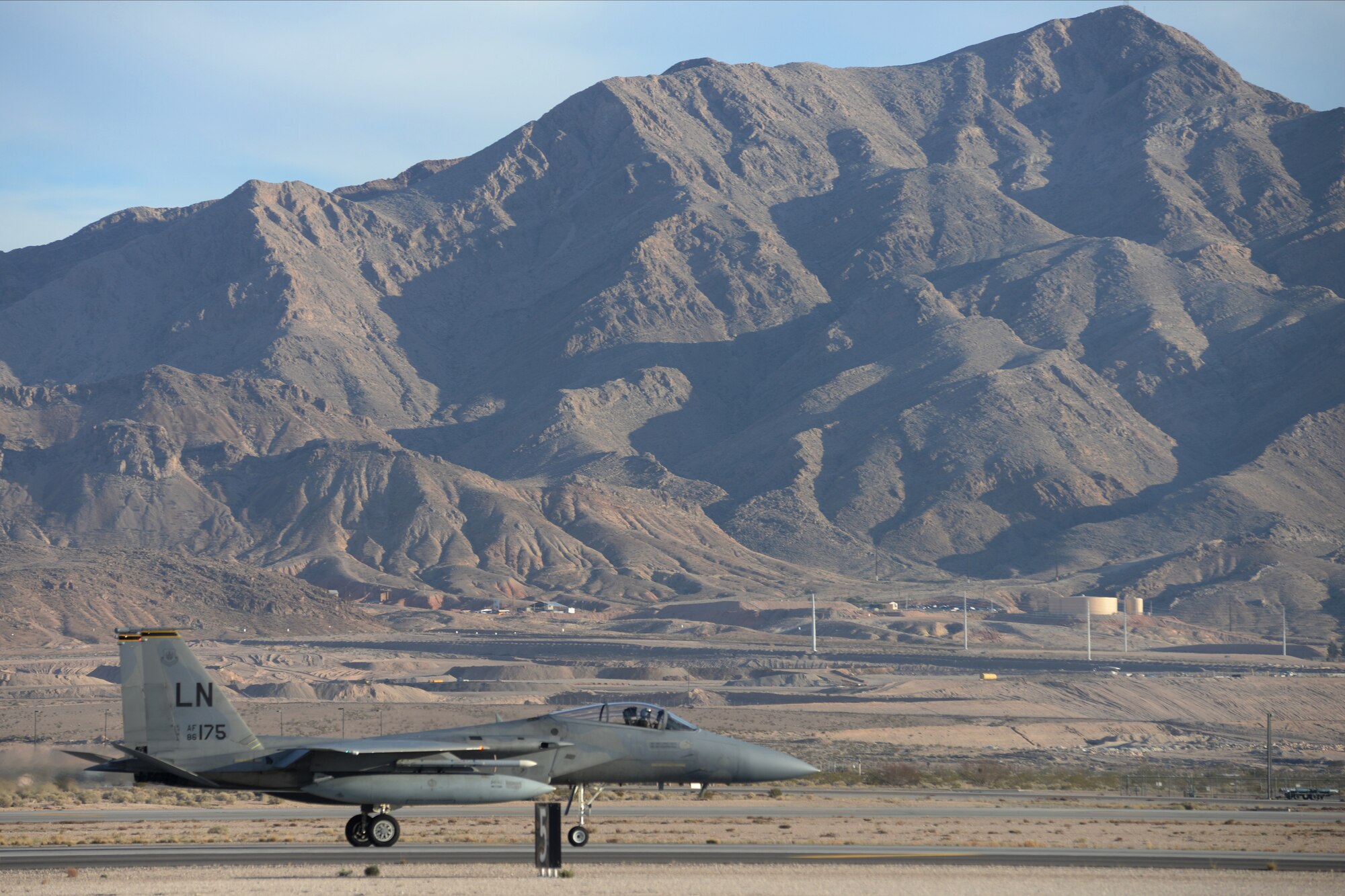 An F-15C Eagle assigned to the 493rd Fighter Squadron, Royal Air Force Lakenheath, England, lands during Red Flag 15-1 at Nellis Air Force Base, Nev., Feb. 2, 2015. The squadron recently won the 2014 Raytheon Trophy as the U.S. Air Force's top fighter squadron. (U.S. Air Force photo by Tech. Sgt. Eric Burks/Released)