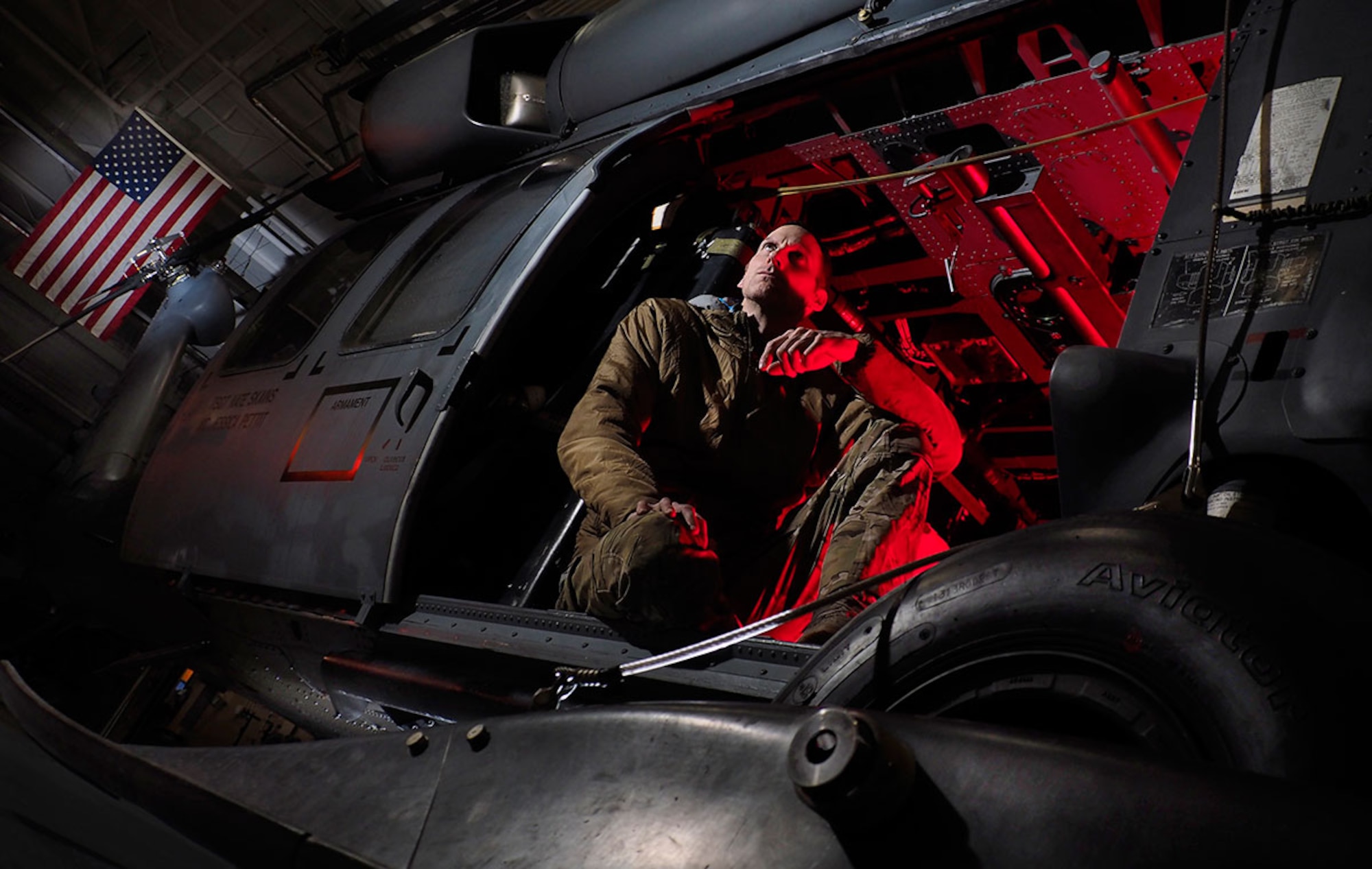 Air Force Master Sgt. Roger Sparks poses in an HH-60G Pave Hawk helicopter on Joint Base Elmendorf-Richardson. Sparks was awarded a Silver Star in July for his role
in saving Soldiers in a 2010 engagement in Afghanistan. (U.S. Air Force photo/Justin Connaher)
