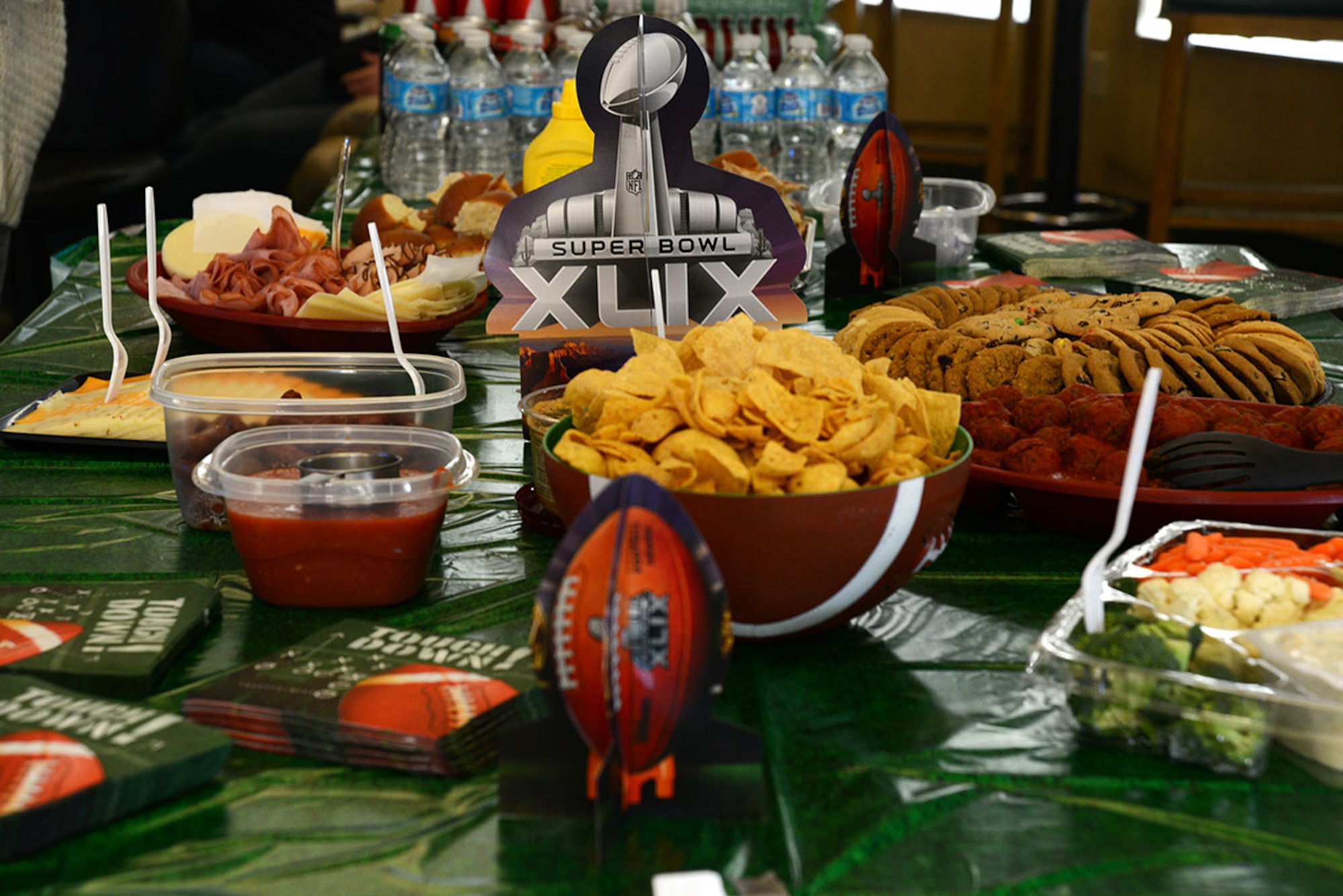 Joint Base Elmendorf-Richardson chaplains hosted a Super Bowl Sunday party with a large variety of food and drinks at the Wired Café on JBER, Feb. 1. The gathering has been taking place for more than four years to bring people together, play games and get Airmen out of the dorms. (U.S. Air Force photo/Airman Christopher R. Morales)