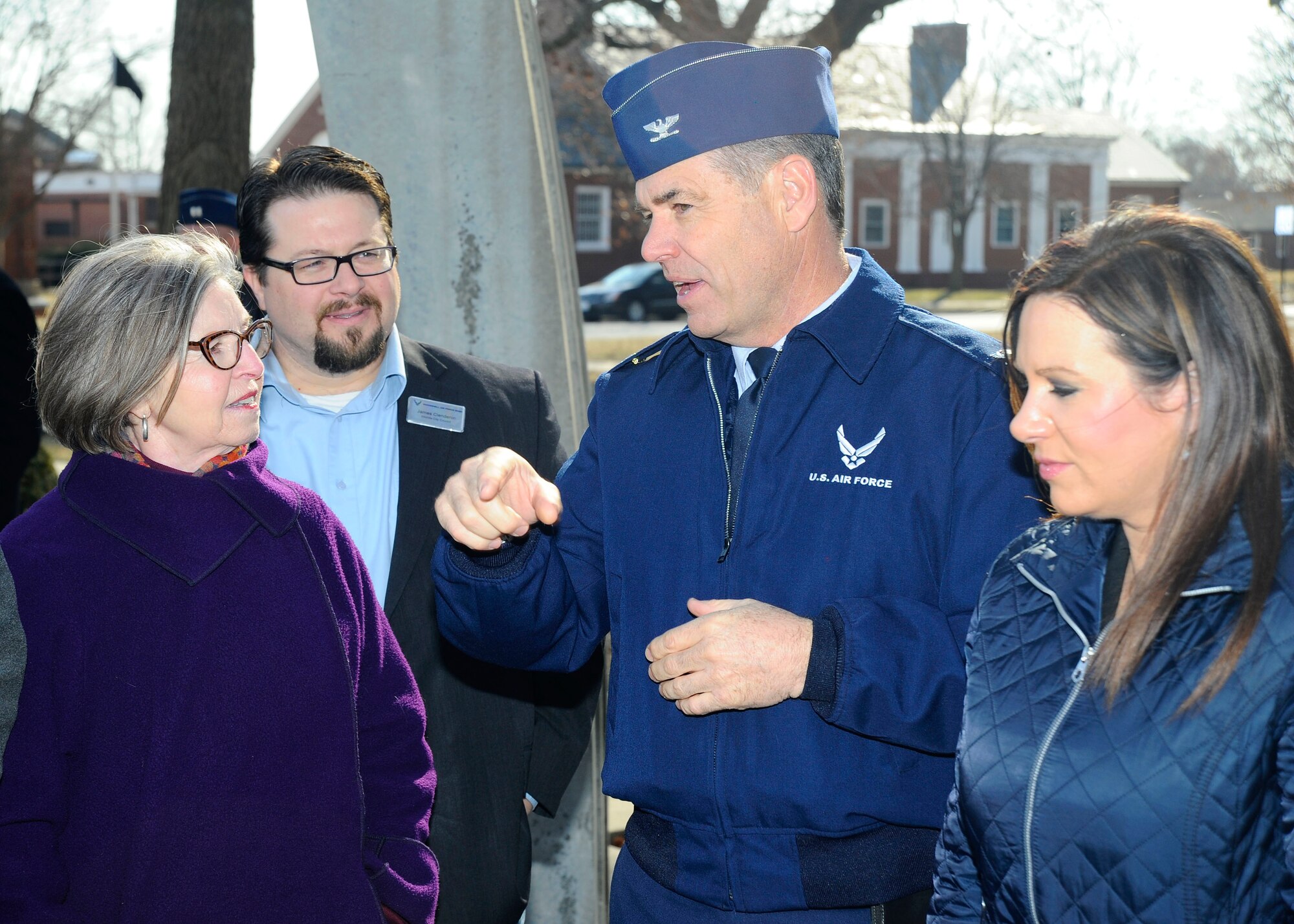 Col. Mark S. Larson, 931st Air Refueling Group commander, speaks with Wichita business leaders about Col. Gail S. Halvorsen, known as the "Candy Bomber," while at the Walk of Fame during a civic leader tour at Scott Air Force Base, Ill., Feb. 4, 2015.  More than 20 business leaders from Wichita, Kan., participated in McConnell's first civic leader tour in more than three years. (U.S. Air Force photo by Senior Airman Victor Caputo)