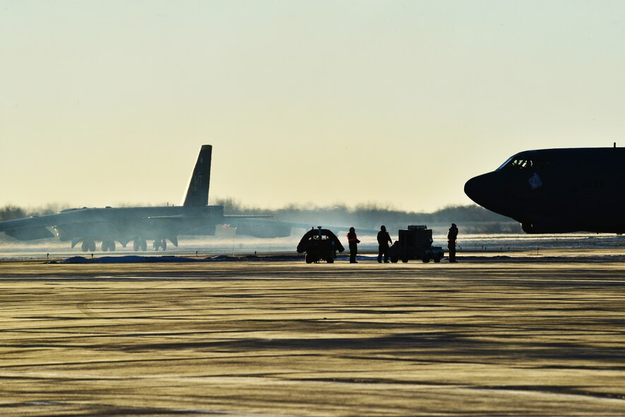 Airmen from the 5th Maintenance Group prepare a B-52H Stratofortress for take off on Minot Air Force Base, N.D., Jan. 12, 2015. Aircraft maintenance Airmen provide maintenance and upkeep to the jets, even during the cold winter months.  (U.S. Air Force photo/Senior Airman Brittany Y. Bateman)