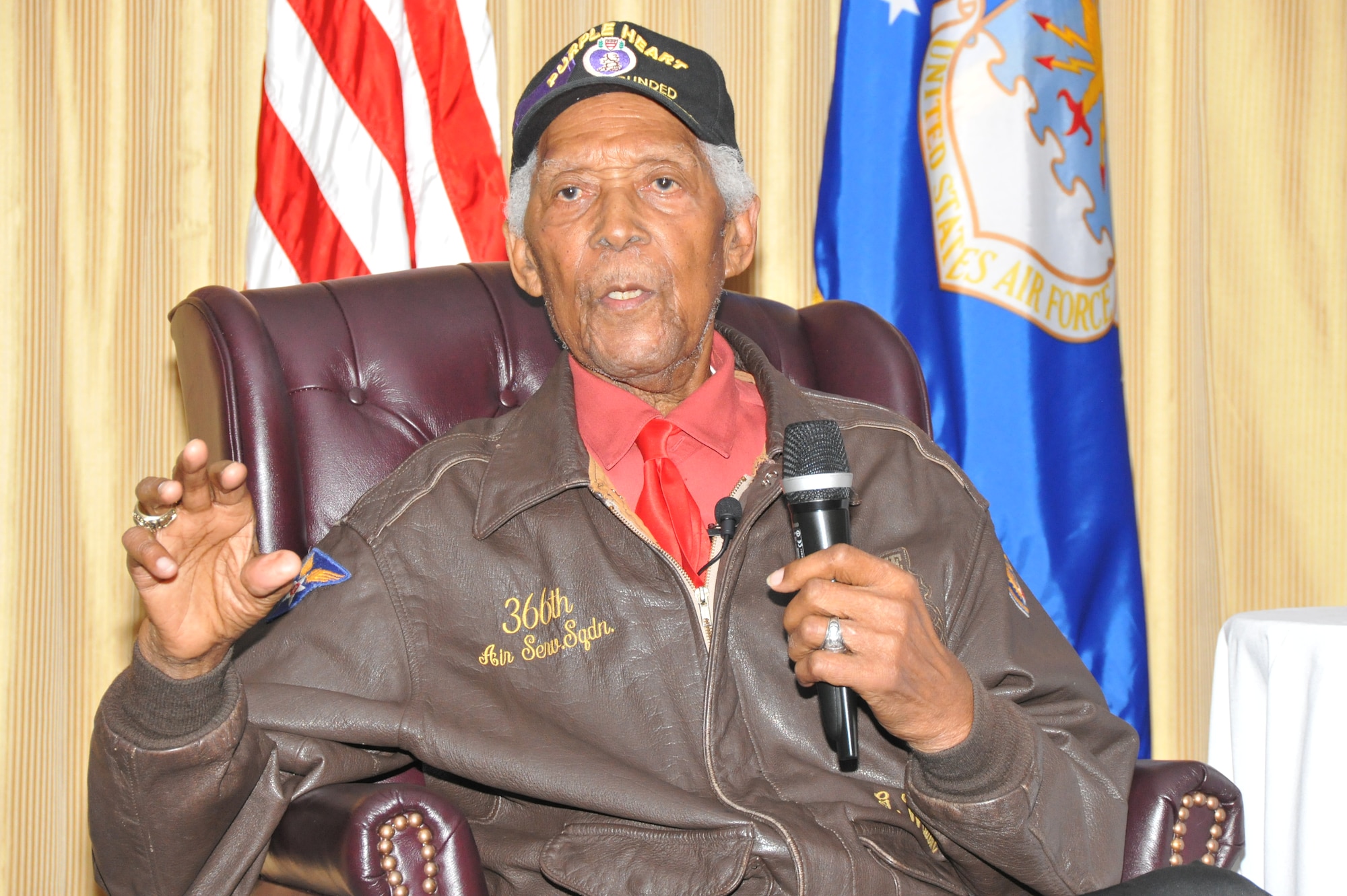 Retired Tech. Sgt. George Watson Sr., an original Tuskegee Airmen, was the guest speaker at the U.S. Air Force Expeditionary Center Annual Awards ceremony at Joint Base McGuire-Dix-Lakehurst, N.J., Feb. 4, 2015. Watson was a member of the 366th Air Service Squadron, which provided field services to the "Red Tails" of the 332d Fighter Group, in Italy during World War II. (US Air Force photo/ Brad Camara)