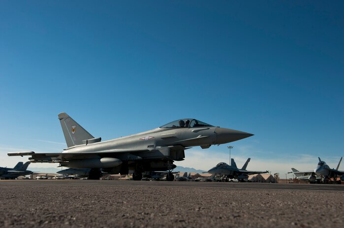A Royal Air Force Typhoon FGR4 assigned to 1 (Fighter) Squadron, RAF Lossiemouth, Scotland, taxis to the runway during Red Flag 15-1 at Nellis Air Force Base, Nev., Feb. 2, 2015. Red Flag provides combat training in a degraded and operationally limited environment intended to make the training missions as realistic as possible. (U.S. Air Force photo by Senior Airman Thomas Spangler)
