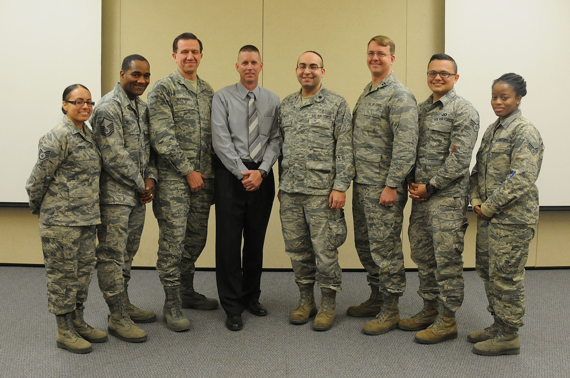 Airmen from the 108th Wing chaplain office pose for a picture at the end of the Traumatic Event Management Course Jan. 16, 2015, at Joint Base McGuire-Dix-Lakehurst, N.J. The Army's TEM course was a week long and focused on unit cohesion and effectiveness to help manage crisis situations. The course used group activities and role playing to reinforce the lessons. At the end of the week, the students are able to take what they learned and bring it back to their units. (U.S. Air National Guard Photo by Airman 1st Class Julia Pyun/Released)
