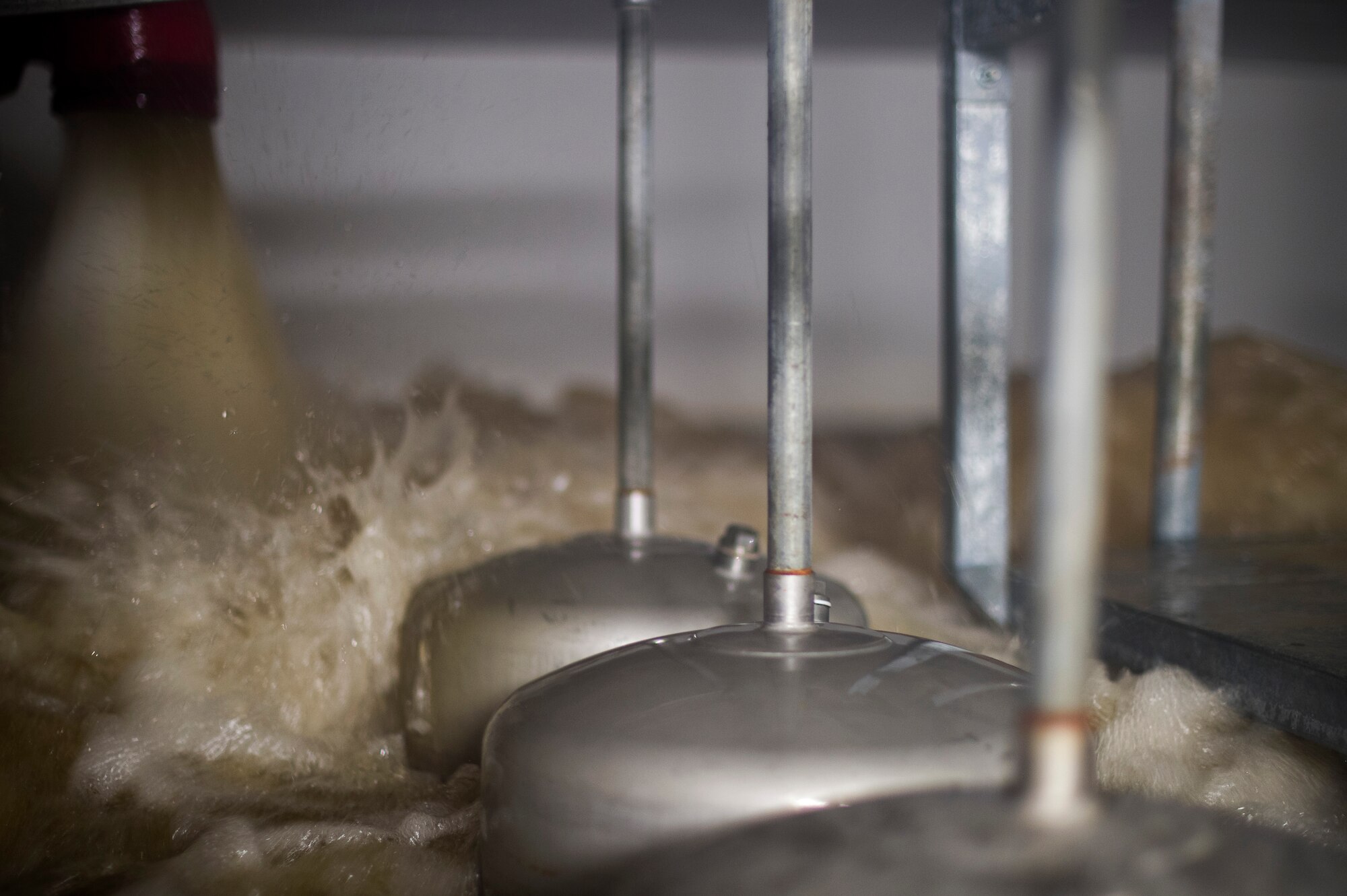 Water pumps into a 46,000 gallon tank inside the Kaiserslautern Military Community Center at Ramstein Air Base, Germany, Jan. 29, 2015. The tank is part of a fire suppression system that helps protect lives and property in case of a fire. (U.S. Air Force photo/Senior Airman Damon Kasberg)