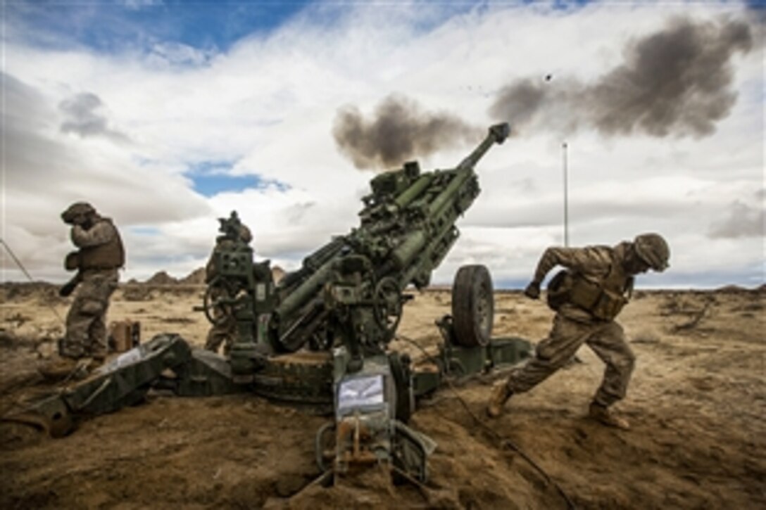 U.S. Marines fire an M777-A2 howitzer down range during Integrated Training Exercise 2-15 on Camp Wilson at Marine Corps Air Ground Combat Center in Twentynine Palms, Calif., Jan. 31, 2015. The Marines are assigned to 1st Battalion,12th Marine Regiment.