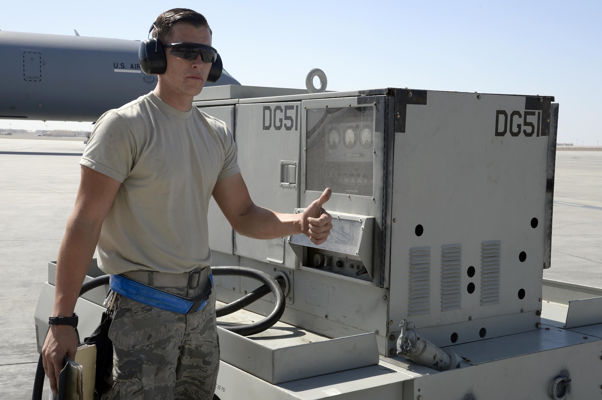 Airman 1st Class Taylor, KC-10 Extender crew chief, verifies that the external power cart is functioning properly at an undisclosed location in Southwest Asia Feb. 2, 2015. Crew chiefs handle many facets of ground operations to include refueling, defueling, marshalling launching and recovering the aircraft. Taylor is currently deployed from Travis Air Force Base, Calif., and is a native of Belleview, S.D. (U.S. Air Force photo/Tech. Sgt. Marie Brown)