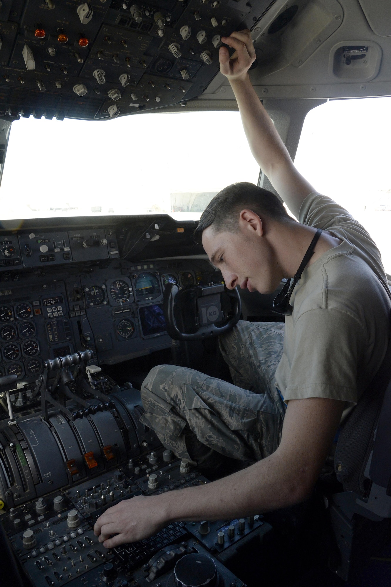 Senior Airman Will, KC-10 Extender instrument and flight control systems technician, performs a preflight inspection on a KC-10 Extender at an undisclosed location in Southwest Asia Feb. 2, 2015. Specialists respond to ‘red balls’, which are malfunctions that occur before flight, as well as delayed discrepancies. Will is deployed from Travis AFB, Calif., and is a native of Glendale, Ariz. (U.S. Air Force photo/Tech. Sgt. Marie Brown)