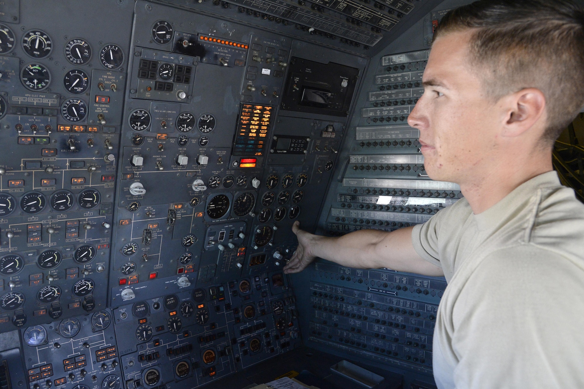 Airman 1st Class Taylor, KC-10 Extender crew chief, performs a preflight inspection aboard a KC-10 Extender at an undisclosed location in Southwest Asia Feb. 2, 2015.  Although the KC-l0 Extender’s primary mission is aerial refueling, it can combine the tasks of a tanker and cargo aircraft by refueling fighters and simultaneously carry the fighter support personnel and equipment on overseas deployments. Taylor is currently deployed from Travis Air Force Base, Calif., and is a native of Belleview, S.D. (U.S. Air Force photo/Tech. Sgt. Marie Brown)