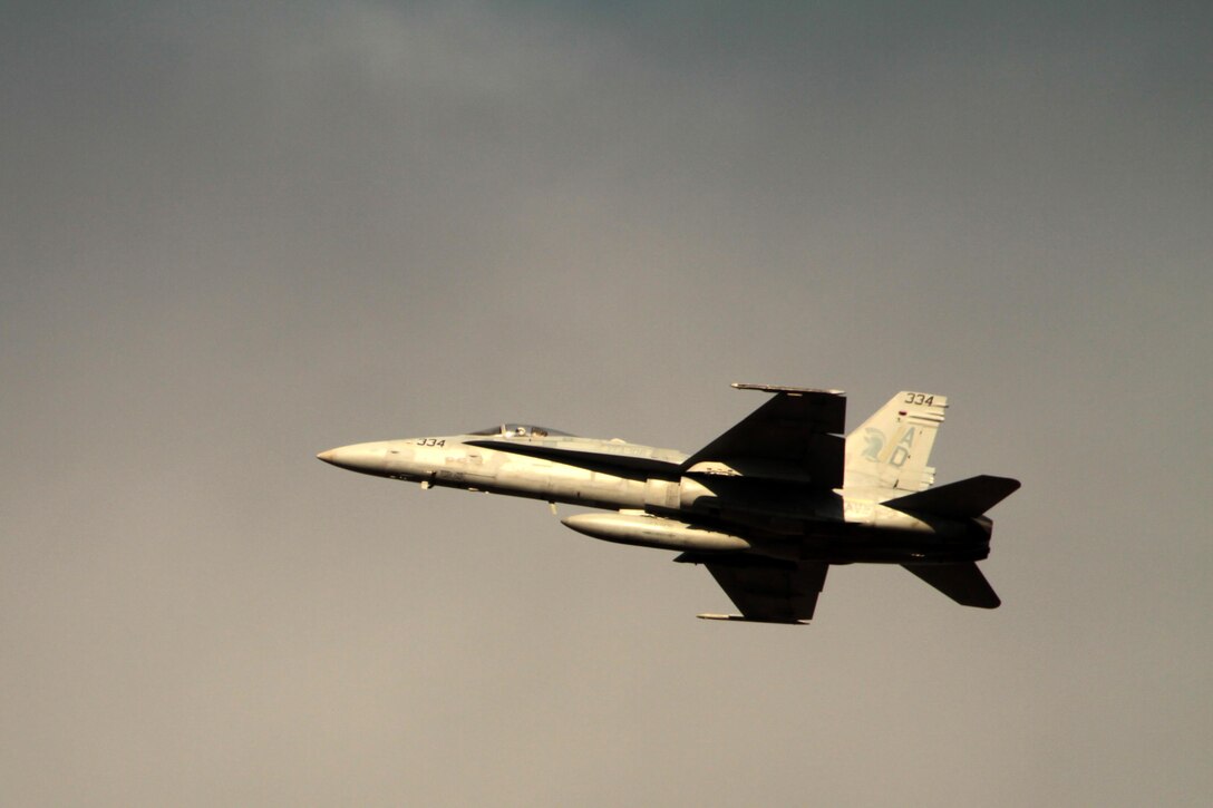 A U.S. Navy F/A-18 Super Hornet with Strike Fighter Squadron 106 flys above the runway at Marine Corps Air Station Cherry Point, N.C., Feb. 5, 2015. 
Cherry Point is home to 2nd Marine Aircraft Wing and several of its squadrons. Its runways operate 24/7, 365 days each year, and the air station hosts squadrons that specialize in air-to-ground attack support; heavy helicopter lift and transport; electronic warfare; aerial transport and refueling; and sea and land search and rescue.
