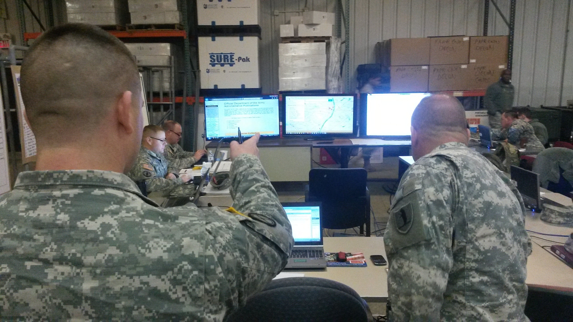 Members of the Missouri National Guard Homeland Response Force’s logistical operations team recently conducted a simulated disaster response.  During the HRF S4 Logistics Workshop held at Lambert International Airport, Sgt. Jennifer Campbell, the team’s Analog NCO, updated the site trackers to reflect the situation at each mock incident site. Trackers like these provide a backup should digital information be lost during a system outage. 