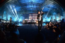 Fall Out Boy lead singer and guitarist Patrick Stump excites the crowd during the VH1 Concert for the Troops at Luke Air Force Base, Arizona, Jan. 30, 2015. The event, hosted by former 98 Degrees band member Nick Lachey, was held to thank military members for their service. (U.S. Air Force photo by Staff Sgt. Nestor Cruz)