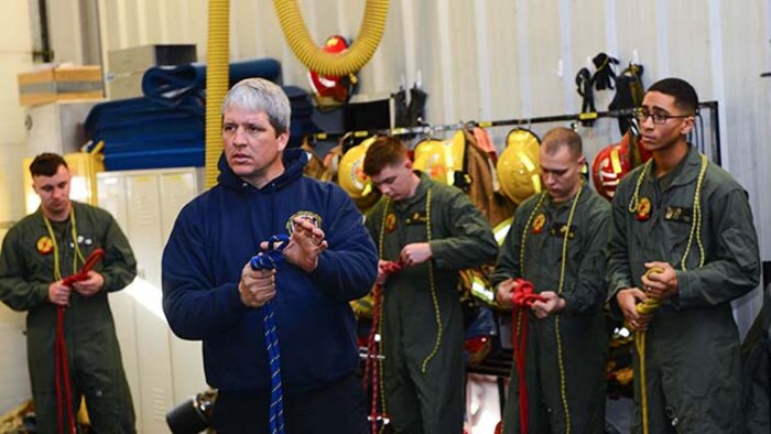 Capt. Mark Cumashot refreshes tying knots with Marines and sailors with Technical Rescue Platoon, Chemical Biological Incident Response Force, Feb. 3, at Henrico Fire Drill Facility in Glen Allen, Virginia. Cumashot is the team leader of the Technical Rescue Team, Henrico County Division of Fire.
