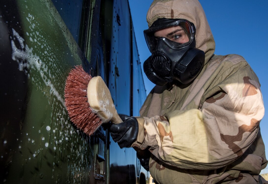 U.S. Marine Cpl. Jordan Fruehling-Thomas conducts detailed equipment decontamination during a reconnaissance, surveillance and decontamination course aboard Camp Pendleton, Calif., Feb. 4, 2015. Fruehling-Thomas is a food service specialist with Combat Logistics Battalion 15, 15th Marine Expeditionary Unit. As the logistics combat element for the 15th MEU, CLB-15 is training to ensure readiness for any situation they may encounter during their upcoming deployment this spring. (U.S. Marine Corps photo by Sgt. Emmanuel Ramos/Released)