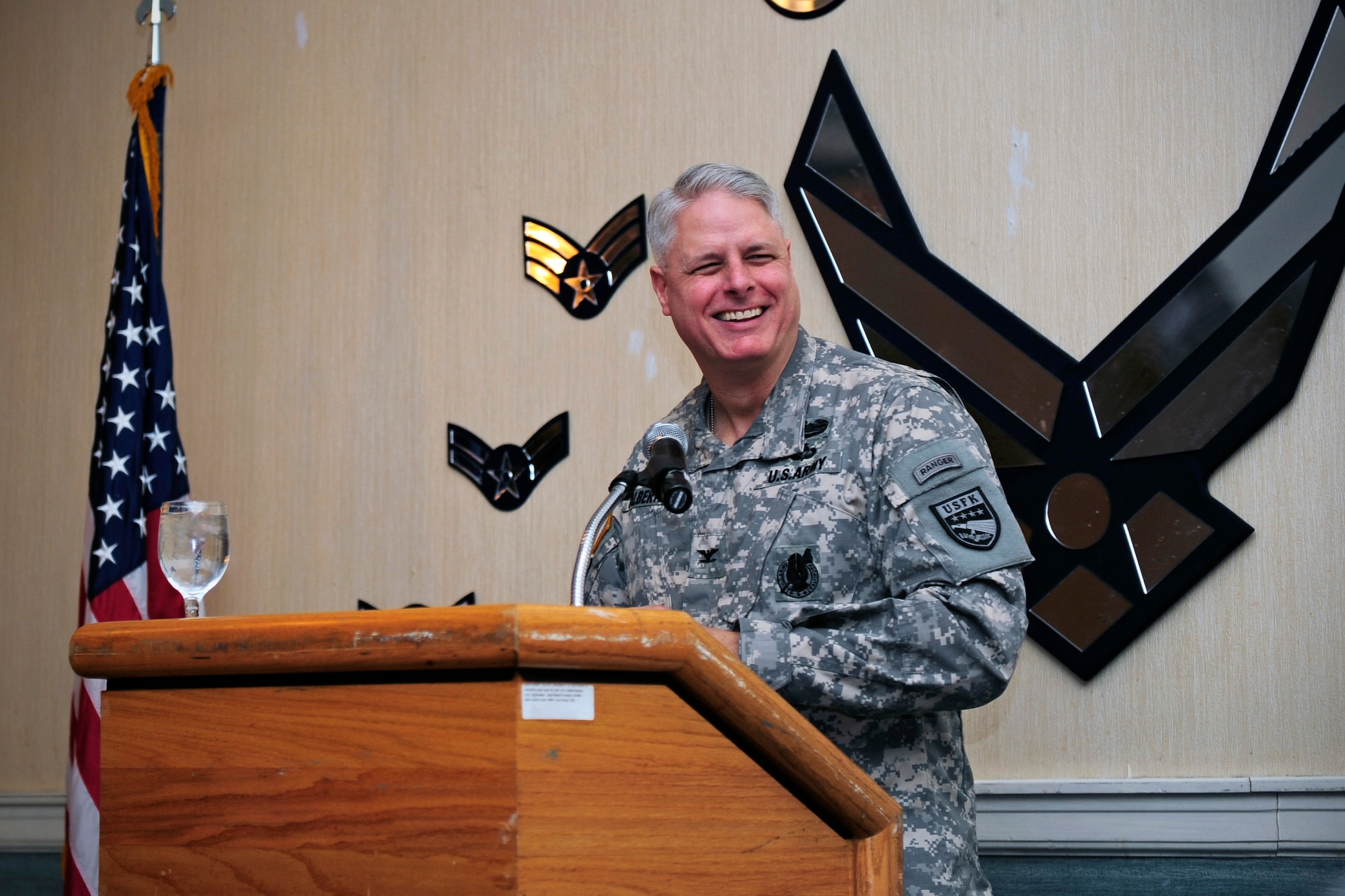 U.S. Army Col. Eric Albertson, United Nations Command, Combined Forces Command, and U. S. Forces Korea command chaplain, delivers remarks during the 2015 National Prayer Breakfast at Kunsan Air Base, Republic of Korea, Feb. 6, 2015. Albertson was the guest speaker for the event and shared personal stories on Soldiers serving with integrity. (U.S. Air Force photo by Senior Airman Taylor Curry/Released) 