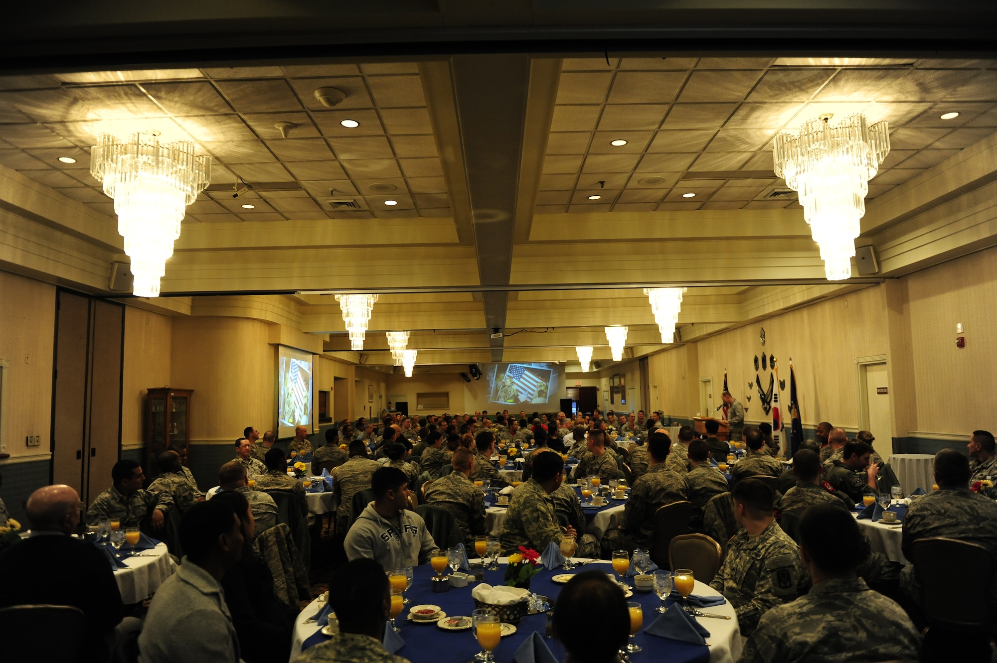 Maj. Jonathan Hurt, 8th Fighter Wing deputy wing chaplain, delivers opening remarks during the 2015 National Prayer Breakfast at Kunsan Air Base, Republic of Korea, Feb. 6, 2015. Approximately 200 members of the 8th Fighter Wing and ROK Air Force 38th Fighter Group attended the prayer breakfast. (U.S. Air Force photo by Senior Airman Taylor Curry/Released) 