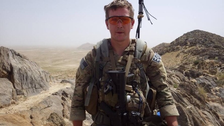 Senior Airman TJ Brantley, 2nd Civil Engineer Squadron Explosive Ordnance Disposal technician, poses for a photo during his deployment in Afghanistan, May 2014. Brantley is being honored in Portraits in Courage volume IX for his efforts during a 10-hour mission, where he suffered a traumatic brain injury and continued to stay in the fight providing cover fire and exposing his body to protect the wounded.  For his courageous action, Brantley has been submitted for the Bronze Star Medal with Valor.  He was awarded the Air Force Combat Action Medal and the Purple Heart. (courtesy photo)