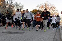 More than 100 service members participated in the monthly Fitness Challenge 5k on Joint Base Charleston, S.C., Feb. 6, 2015. (U.S. Air Force photo/Senior Airman Jared Trimarchi)