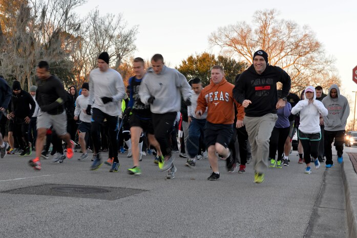 More than 100 service members participated in the monthly Fitness Challenge 5k on Joint Base Charleston, S.C., Feb. 6, 2015. (U.S. Air Force photo/Senior Airman Jared Trimarchi)