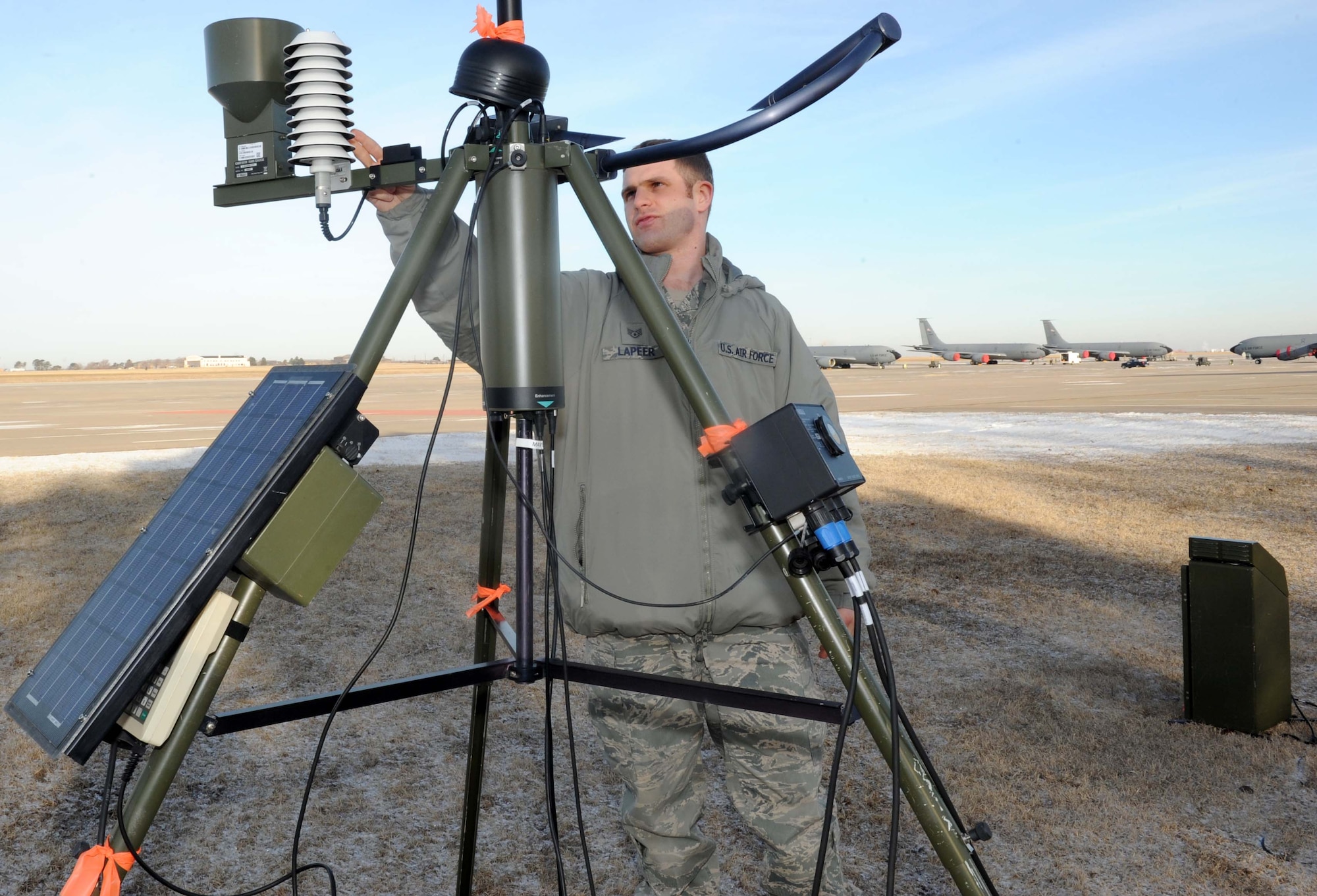 Staff Sgt. Tom Lapeer, 22nd Operation Support Squadron weather forecaster, checks the gages on a tactical weather observing system, Feb. 5, at McConnell Air Force Base, Kan. The observing system is one of many tools 22nd OSS meteorologists use to forecast weather in order to keep McConnell’s personnel and equipment safe. (U.S. Air Force photo/Airman 1st Class Tara Fadenrecht)