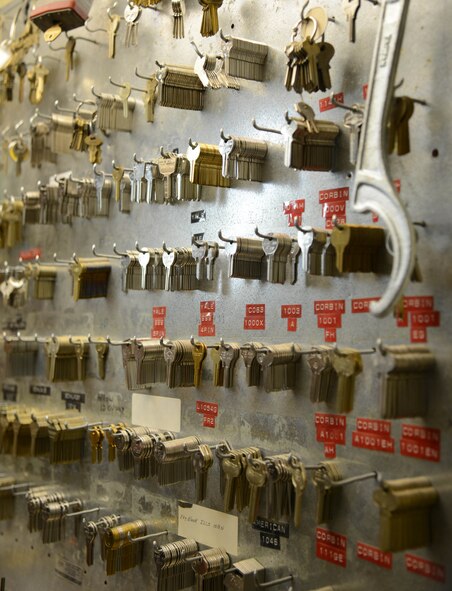 Dozens of different keys hang on a wall at the 341st Civil Engineer Squadron lock shop Feb. 3, 2015, at Malmstrom Air Force Base, Mont. Each key is used for different bands of locks and each has a specific number of tumblers it can work with. (U.S. Air Force photo/Airman 1st Class Dillon Johnston)
