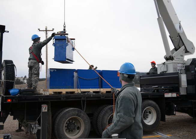 Airmen from the 341st Missile Maintenance Squadron worked to keep the launch facilities in the missile field working at optimal levels Feb. 2. Their work included swapping out batteries which keep the LFs running, removing one missile and replacing another. Maintenance in the field is essential in keeping missiles ready and on alert at all times. (U.S. Air Force photo/Airman 1st Class Dillon Johnston)