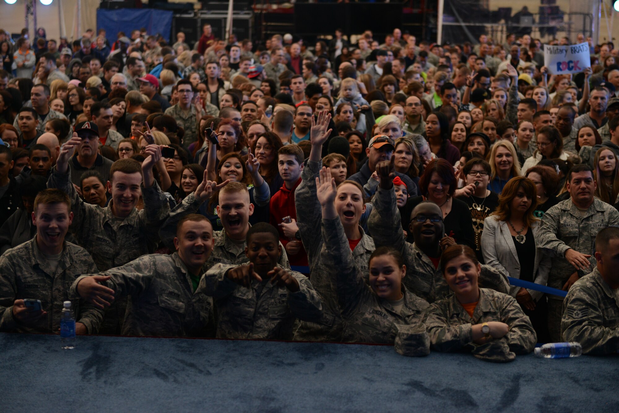 Airmen gather around the stage awaiting the arrival of Fall Out Boy and Charli XCX for the Papa John’s/VH1 concert Jan. 30 at Luke Air Force Base. The concert was hosted by former 98 Degrees band member Nick Lachey. (U.S. Air Force photo/Senior Airman James Hensley)