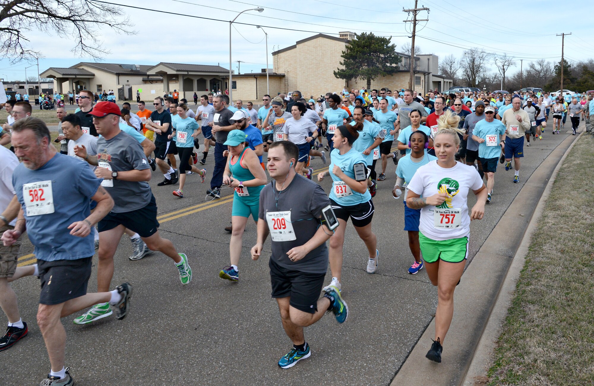 Approximately 467 participants either walked or ran in the “Days of Elijah” Spiritual Fitness 5K & 2K Fun Run/Walk on Jan. 28 at the Tinker Chapel. Along the path, people encouraged the participants with cheers and posters about resiliency and spiritual fitness in their lives. (Air Force photo by Kelly White)