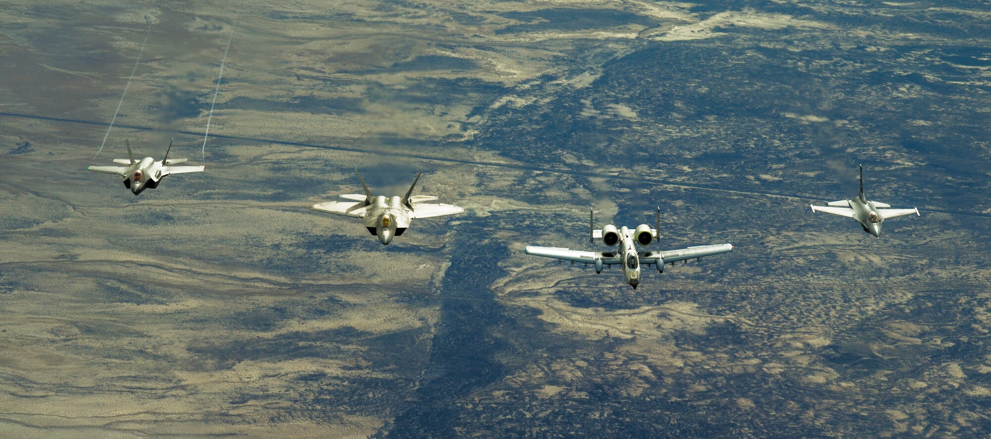 Air Force Reserve Command pilots from the 514th Flight Test Squadron here flew an historic four-ship formation of Ogden Air Logistics Complex depot fighter aircraft (from left to right: F-35, F-22, A-10, F-16) The jets were over the Utah Test and Training Range approximately 75 miles west of Hill AFB, setting up to execute scheduled functional check flights and proficiency training missions, Jan. 29. (Air Force photo)