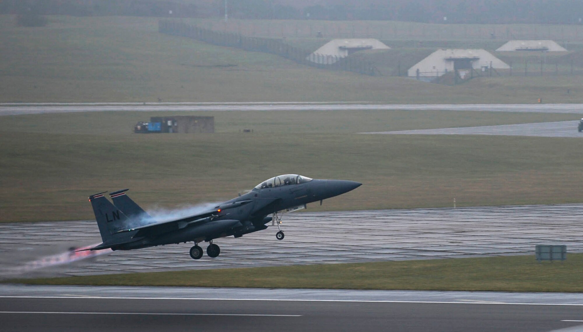 A 494th Fighter Squadron F-15E Strike Eagle takes off from Royal Air Force Lakenheath, England, Feb. 5, 2015. The pilots of the 494th Fighter Squadron, known as the Panthers, participated in a three-day exercise to evaluate their response time to simulated alerts. The Panthers focused on maintaining joint readiness while building interoperable capabilities. (U.S Air Force photo by Airman 1st Class Dawn M. Weber/Released)