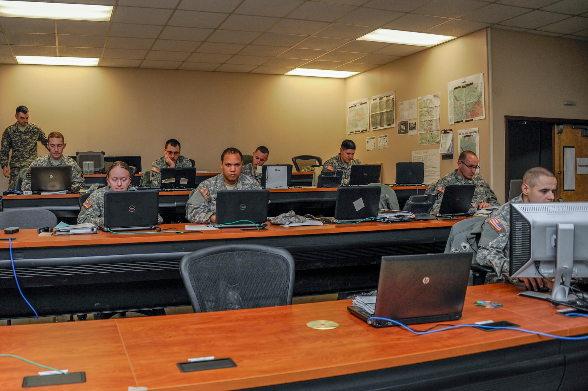 Soldiers from the 719th Movement Control Battalion out of Boston, Massachusetts, monitor convoy movements during Warrior Exercise Artic Lightning at Joint Base McGuire-Dix-Lakehurst, New Jersey Jan. 10-31, 2015. Active duty Soldiers of the 573rd Movement Control Team from Fort Carson, Colorado and Reservists from the 719th MCB utilized the Portable Deployment Kit to track convoy movements from Fort A.P. Hill to JB MDL, during this year’s WAREX 78-15-01. (U.S. Air Force photo by Pascual Flores/Released)