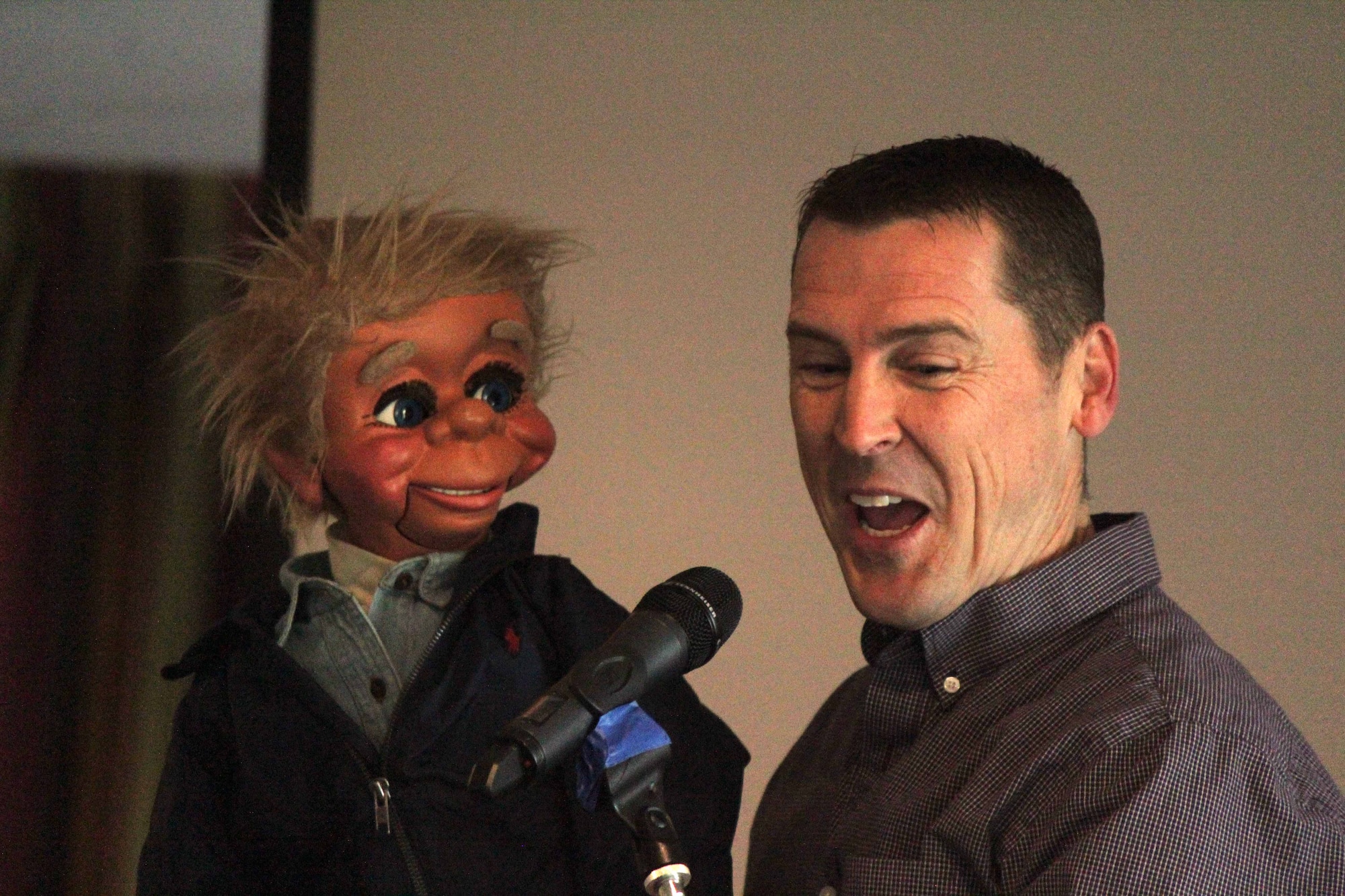 U.S. Air Force Chaplain (Maj.) Randy Croft, 100th Air Refueling Wing deputy chaplain from Walla Walla, Wash., entertains children during an RAF Mildenhall Chapel Family Care retreat Jan. 25, 2015, at a holiday village in Elveden, Suffolk. Croft learned the hobby of ventriloquism as a child. (Courtesy photo)