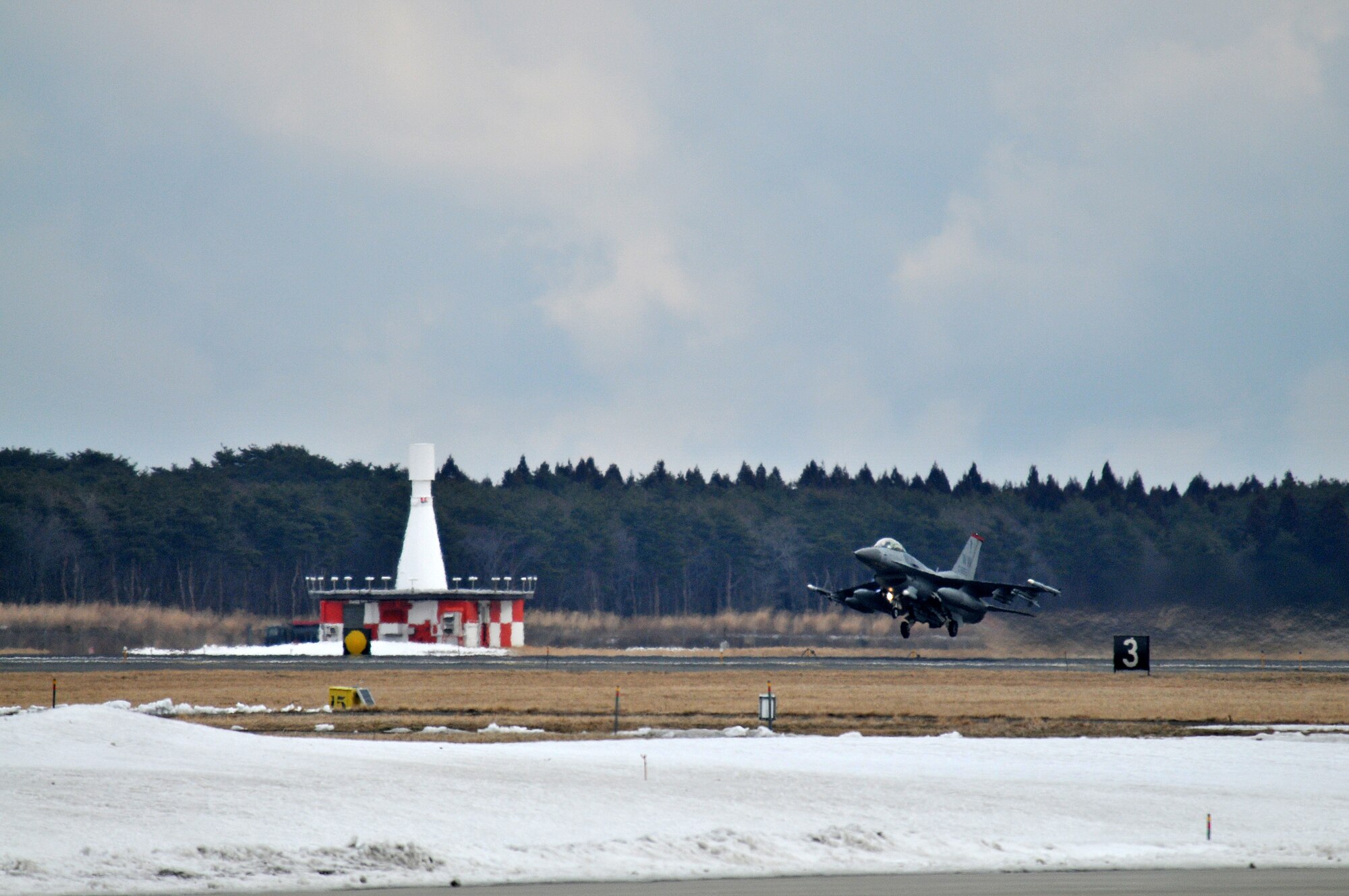 F-16 Fighting Falcons and approximately 400 Airmen from Misawa Air Base, Japan, depart to participate in COPE NORTH 2015, a multilateral operational training exercise in Andersen AFB, Guam, Feb. 2, 2015. This exercise allows the U.S. Air Force and Navy, Japan Air Self Defense Force, Royal Australian Air Force and Royal New Zealand Air Force to conduct a variety of training to include humanitarian assistance and disaster relief, as well as air combat tactics and air-to-ground strike missions in the Pacific theater of operations. (U.S. Air Force photo by Tech. Sgt. April Quintanilla)