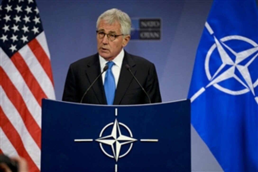 U.S. Defense Secretary Chuck Hagel holds a news conference at NATO headquarters in Brussels, Feb. 5, 2015. Hagel addressed a range of topics, including security across the continent and Russian aggression in Ukraine.