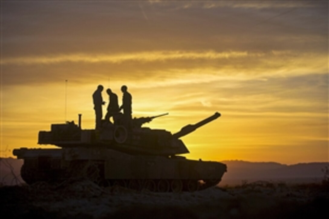 U.S. Marines prepare for the tank mechanized assault course during Integrated Training Exercise 2-15 on Marine Corps Air Ground Combat Center in Twentynine Palms, Calif., Feb. 1, 2015. The Marines are assigned to the 1st Marine Division's Delta Company, 1st Tanks Battalion.

