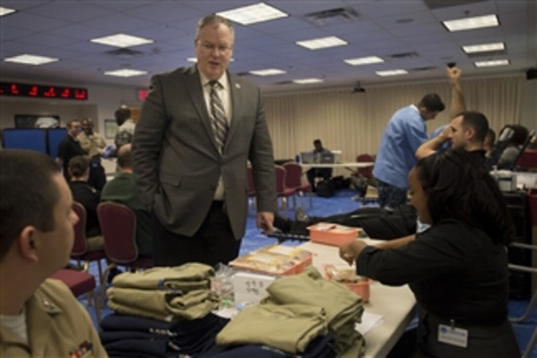 Deputy Defense Secretary Bob Work stops by the First Class Petty Officer Association blood drive at the Pentagon, Feb. 6, 2015, to thank volunteers and donors for their efforts.