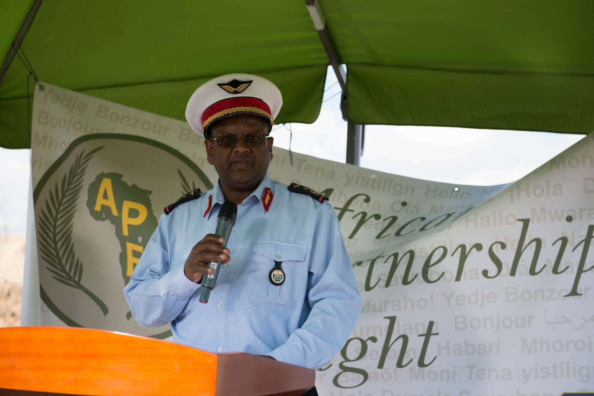 DJIBOUTI AIR BASE, Djibouti -- Djiboutian air force Lt. Col. Kalinleh Wahib, Djibouti air force chief commander, delivers his remarks during the opening ceremony for African Partnership Flight on Djibouti Air Base, Djibouti, Feb. 7, 2015. The U.S. Air Force is co-hosting African Partnership Flight with the Djiboutian air force and about 60 Airmen from Burundi, Kenya, Tanzania and Uganda will participate. (U.S. Air Force photo/Tech. Sgt. Benjamin Wilson)