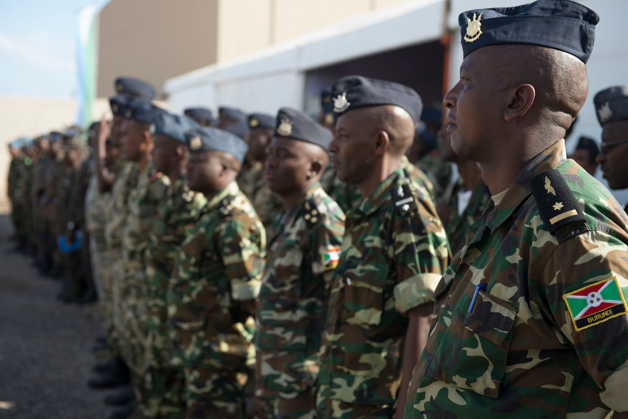 DJIBOUTI AIR BASE, Djibouti -- Burundi Airmen stand in formation during the opening ceremony for African Partnership Flight on Djibouti Air Base, Djibouti, Feb. 7, 2015. African Partnership Flight is the premier program for delivering aviation security cooperation. (U.S. Air Force photo/Tech. Sgt. Benjamin Wilson)