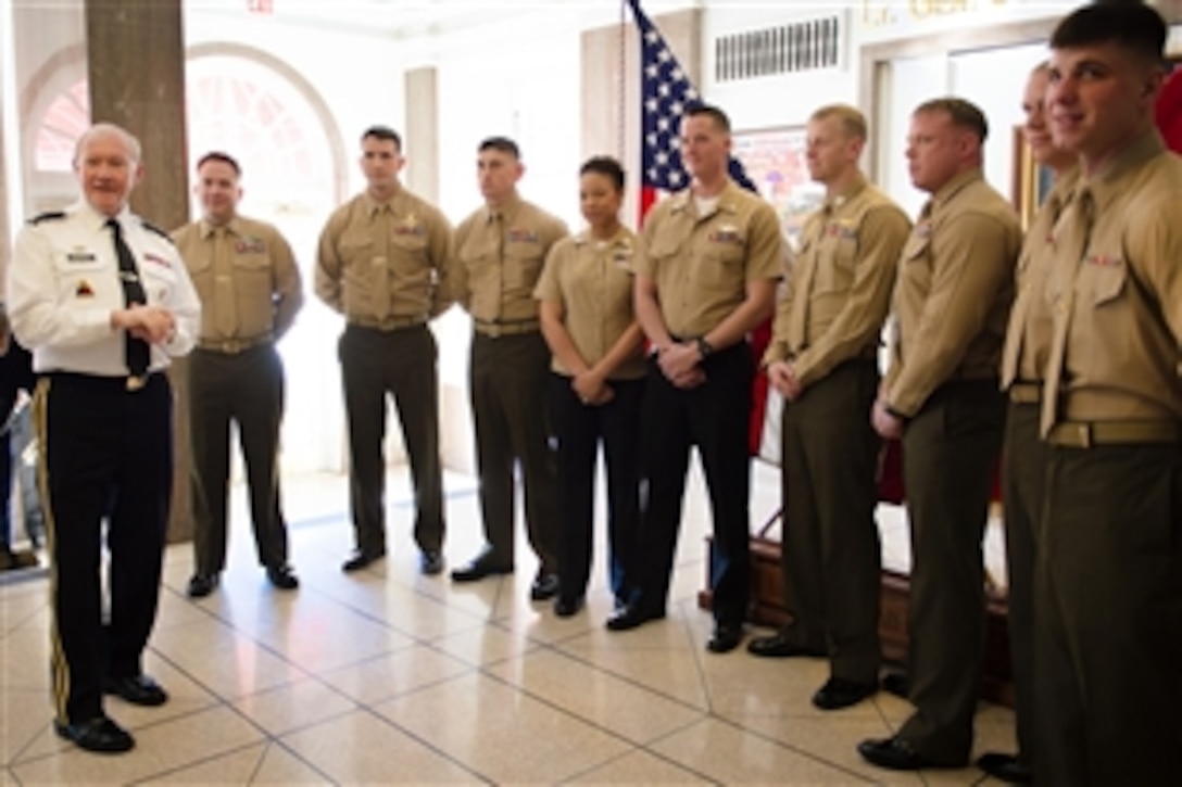 Joint Chiefs of Staff Chairman Gen. Martin E. Dempsey talks with Marines and sailors assigned to the 2nd Marine Expeditionary Force during a visit to Camp Lejeune, N.C., Feb. 6, 2015.
