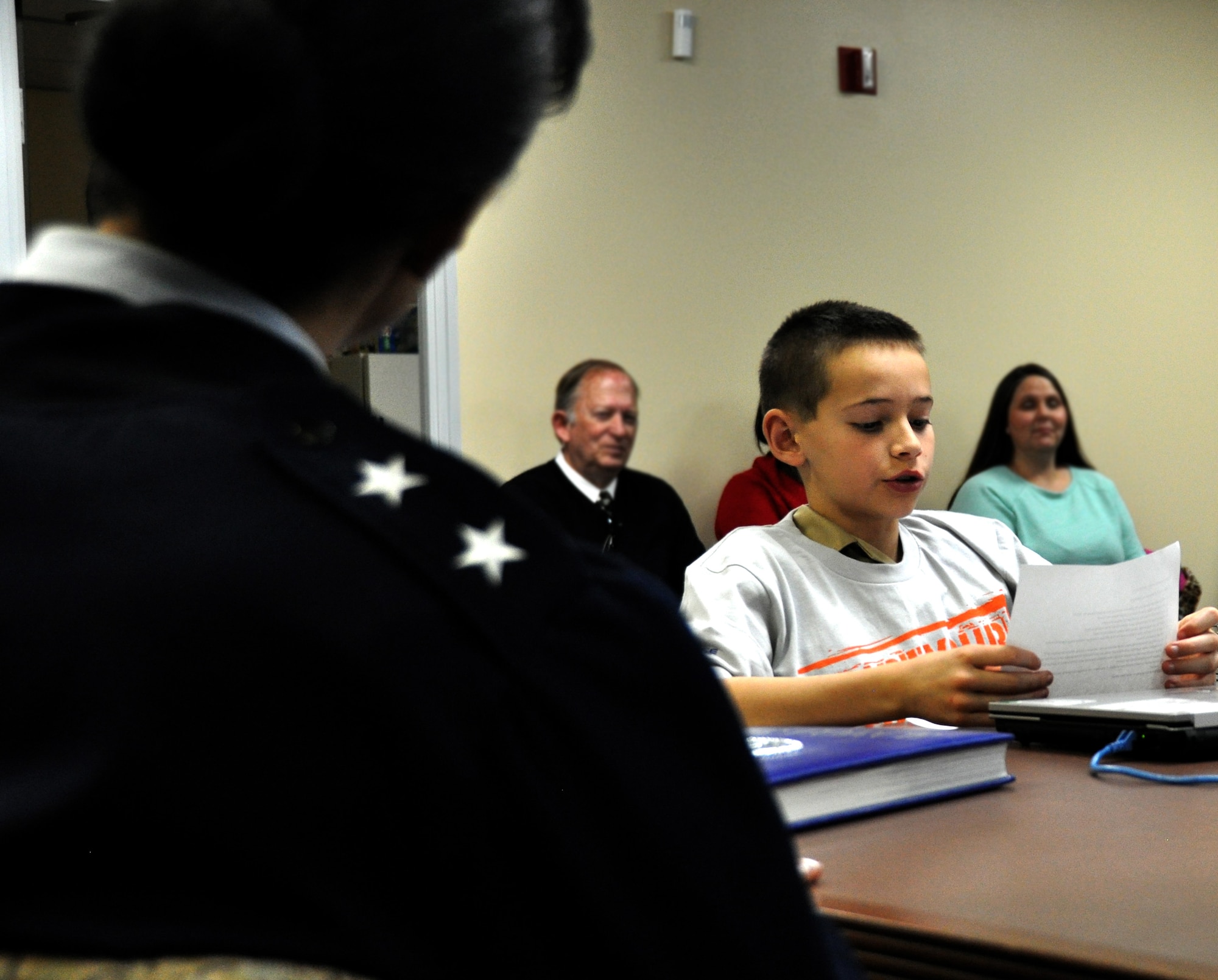 Dalton Moyse, a student at Bright Star Elementary in Douglasville, Ga. asks Maj. Gen. Stayce Harris, 22nd Air Force commander, a question at the 22nd AF headquarters at Dobbins Air Reserve Base, Ga., Feb. 7, 2015. Ten students from Bright Star visited the installation to interview Harris for Black History month. (U.S. Air Force photo/Senior Airman Daniel Phelps)